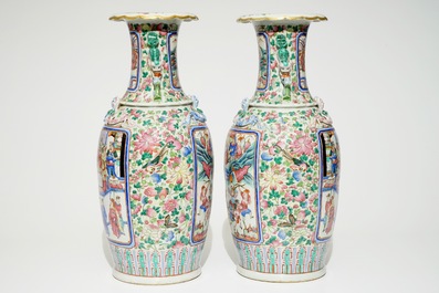 A pair of Chinese famille rose vases with court scenes, 19th C.