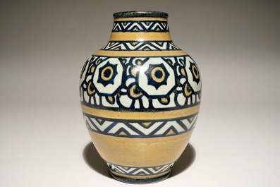 A stoneware vase with stylised flowers, Charles Catteau for Boch Fr&egrave;res Keramis, ca. 1924