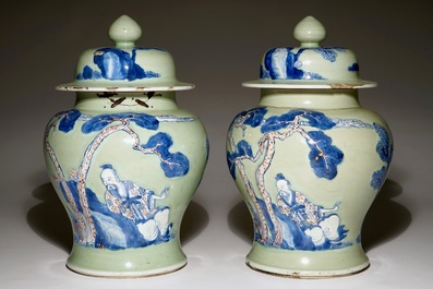 A pair of Chinese celadon, copper-red and underglaze blue vases and covers, Kangxi