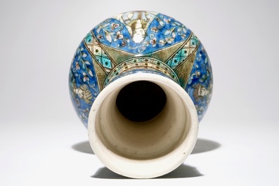 An Islamic Qajar pottery bottle-shaped vase, Iran, 19th C.