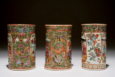 Three Chinese Canton rose medallion relief-decorated and pierced brushpots, 19th C.