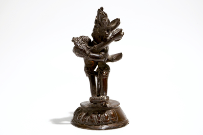 A Sino-Tibetan bronze figure of Mahakala with Sakti, 19th C.