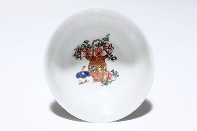 A Chinese famille rose cup and saucer with floral design, Yongzheng