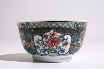 A Chinese famille rose cup and saucer with floral design, Yongzheng