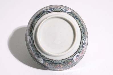 A Chinese famille rose cup and saucer with floral design, Yongzheng