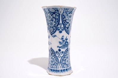 A Dutch Delft blue and white chinoiserie beaker vase, late 17th C.