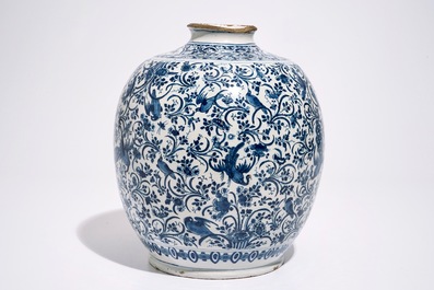 A Dutch Delft blue and white jar with peacocks among foliage, 17th C.