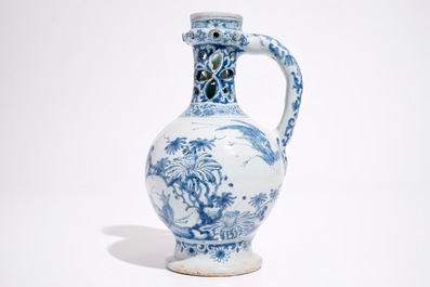 A rare Dutch Delft blue and white chinoiserie puzzle jug, late 17th C.