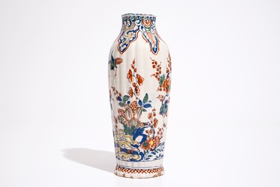 A gadrooned Dutch Delft cashmire palette vase with birds among flowers, ca. 1700