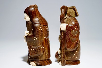 A pair of Japanese okimono in ivory and wood, Meiji, signed