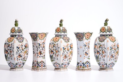Une garniture de cinq vases en fa&iuml;ence de style Delft polychrome, France, 19&egrave;me