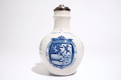 A Dutch Delft orangist text jug with the arms of King William III, 17th C.