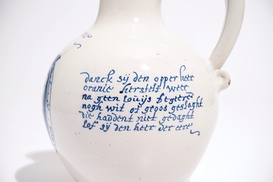 A Dutch Delft orangist text jug with the arms of King William III, 17th C.