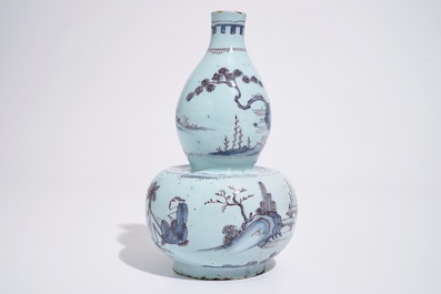 A Dutch Delft double gourd chinoiserie vase in blue and manganese, late 17th C.