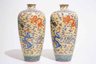 A pair of tall Chinese yellow ground meiping dragon vases, Qianlong mark, 20th C.
