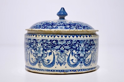 A Dutch Delft blue and white tobacco box and cover, 18th C.