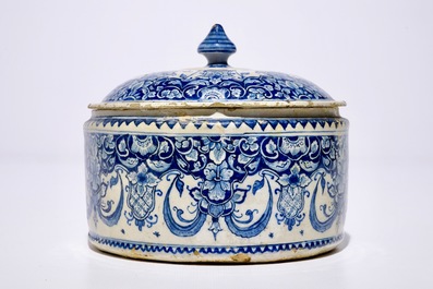 A Dutch Delft blue and white tobacco box and cover, 18th C.