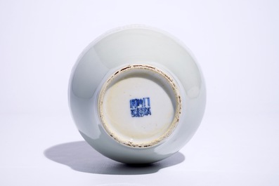 A Chinese monochrome white-glazed olive-shaped vase with underglaze design, Qianlong mark,  19th C.