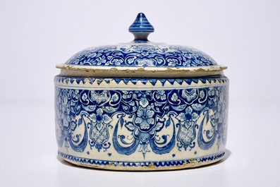 A Dutch Delft blue and white tobacco box and cover, 18th C.