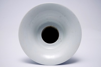 A rare blue, white and lavender-glazed reticulated revolving zhadou spittoon, Qianlong mark, 19/20th C.