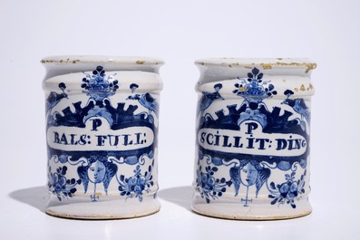 A pair of small Dutch Delft blue and white albarello-shaped pharmacy drug jars, 18th C.