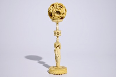 A Chinese carved ivory puzzle ball on stand, Canton, 19th C.