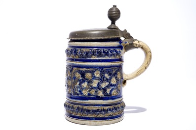 A Westerwald stein with pewter lid decorated with &quot;Daniel in the lion's den&quot;, 17th C.