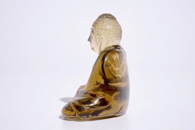 A Chinese smoked rock crystal model of Buddha, 19/20th C.