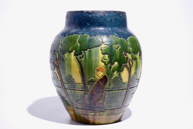 A large Flemish pottery vase with figures below trees, prob. Laigneil, Kortrijk, early 20th C.