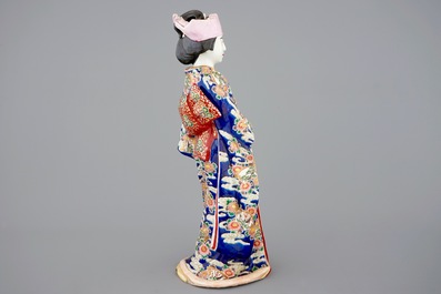 A large Japanese Kutani figure of a bijin, Meiji, 19th C.