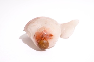 A Chinese carved red and white jade snuff bottle in the shape of a carp, 19th C.