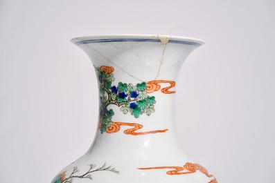 A Chinese doucai vase, Kangxi mark, with a Nanking famille rose crackle glaze vase, 19/20th C.