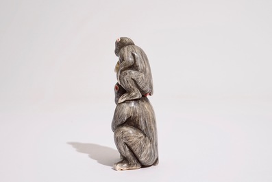 A Japanese ivory okimono of two monkeys, Meiji/Taisho, 19/20th C., signed