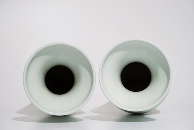 A pair of Chinese blue and white on celadon ground vases, 19th C.