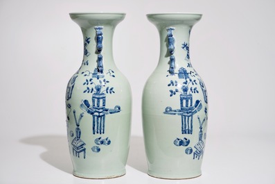 A pair of Chinese blue and white on celadon ground vases, 19th C.