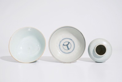 A Chinese blue and white bowl, an incised celadon vase and a celadon bowl, Ming and 19th C.