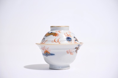 A Chinese Imari-style covered cup and saucer with dragons, Kangxi