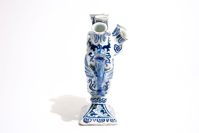 A Dutch Delft blue and white heart-shaped tulip vase with cupids, ca. 1700