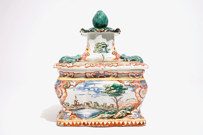 A Dutch Delft polychrome petit feu tobacco box and cover with fine landscapes, 18th C.