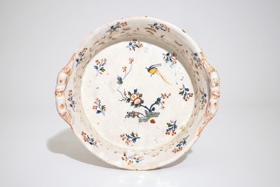 A reticulated polychrome Brussels faience &ldquo;La Haie Fleurie&rdquo; basket on stand, 18th C.