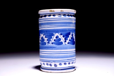 A Dutch Delft blue and white albarello with ornamental design, 17th C.