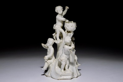 A white Delft group of putti playing music, probably German, 18th C.