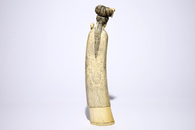 A tall Chinese carved ivory figure of Guanyin, 19th C.