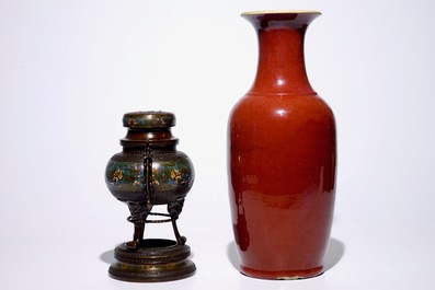 A Chinese monochrome oxblood vase and a bronze incense burner, 19th C.