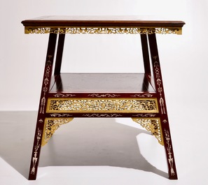 A Chinese parcel-gilt and sculpted wood table with bone inlay, 20th C.