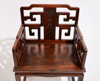 A pair of Chinese carved hardwood chairs, 19th C.