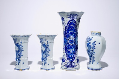 A Dutch Delft blue and white three-piece garniture and a large singular vase, 18th C.