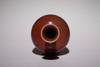 A Chinese monochrome copper-red vase, Kangxi mark, 19/20th C.