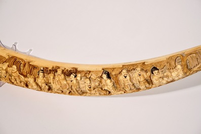 A large Chinese carved ivory tusk, early 20th C.