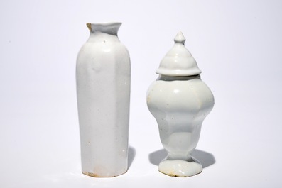 A white Dutch Delft rouleau vase and a vase with cover, 17/18th C.